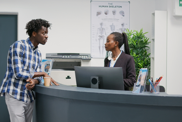 patient talks to gp receptionist