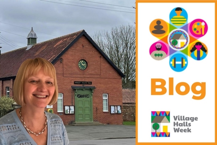 A smiling woman stands in front of a brick village hall with a clock above the door. Beside her, a colourful graphic displays icons, the word Blog, and the Village Halls Week logo, promoting rural wellbeing and the importance of village halls.