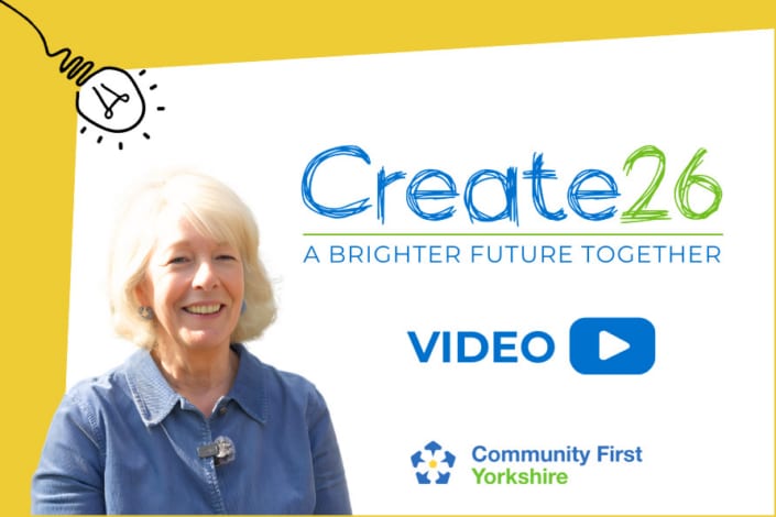 Smiling older woman with white hair stands beside the Create26: A Brighter Future Together logo, a play button labelled video, and the Community First Yorkshire logo, on a yellow and white background with a leadership lightbulb illustration.