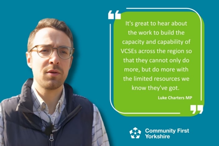 A man wearing glasses and a jacket stands beside a green quote box that reads, It’s great to hear about the work to build the capacity and capability of VCSEs... to do more with limited resources. Community First Yorkshire logo. Luke Charters MP is present.