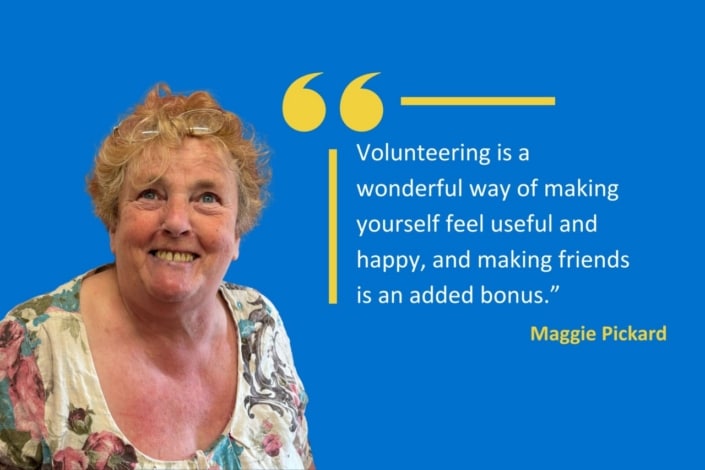 Smiling older woman with curly hair stands in front of a blue background. Next to her is a quotation from Maggie Pickard about volunteering, highlighting its sense of purpose and the joy of building friendships.