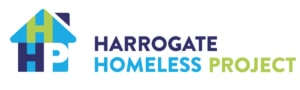 Logo for Harrogate Homeless Project featuring a house icon with the letters HHP and the organisation name in blue, teal, and green text to the right, reflecting its mission in Harrogate.