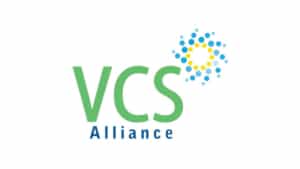 The image shows The VCS Alliance logo with VCS in large green letters above Alliance in blue, next to a swirl of blue and yellow dots forming a circular shape. This distinctive branding highlights the organisation’s presence in Bradford and its commitment to community, guided by the vision of the Director of Culture.