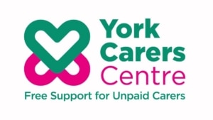 Logo for York Carers Centre featuring a stylised heart icon above the text Free Support for Unpaid Carers.